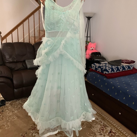 Light blue Rufflel Gown In Net Fabric - Picture 1 of 1